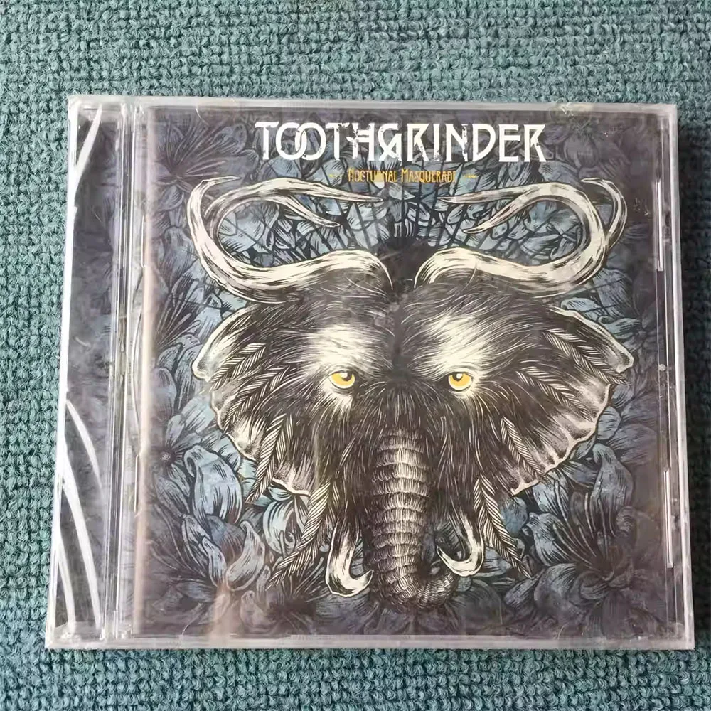 

CD "Nocturnal Masquerade" Is The Debut Full-length Studio Album By American Progressive Metalcore/djent Band Toothgrinder