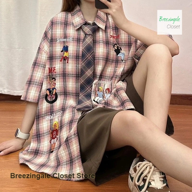 

American retro cartoon characters embroidered plaid shirt female summer fashion loose Joker casual cartoon couple short sleeves.