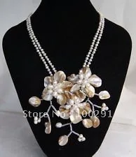 

Ожерелье из двух рядов с тремя милыми цветками-ракушками, 19 дюймов.