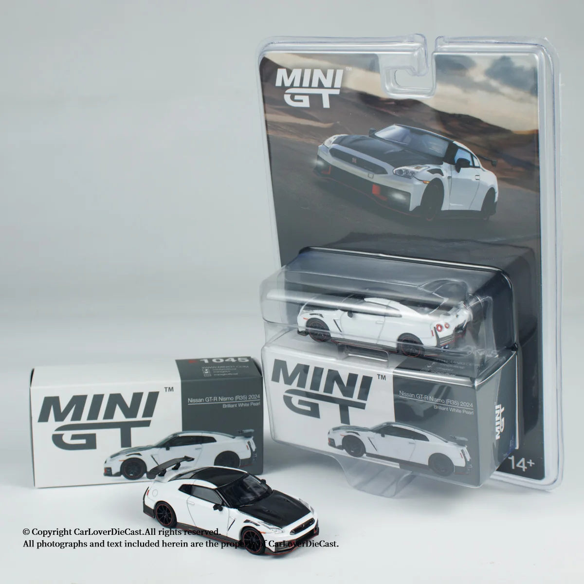 รถของเล่น MINIGT 1:64 นิสสัน จีทีอาร์ นิสโม ปี 2024 สีขาวมุกสดใส รุ่น MGT01045-CH ผลิตจากโลหะผสม สำหรับเด็ก