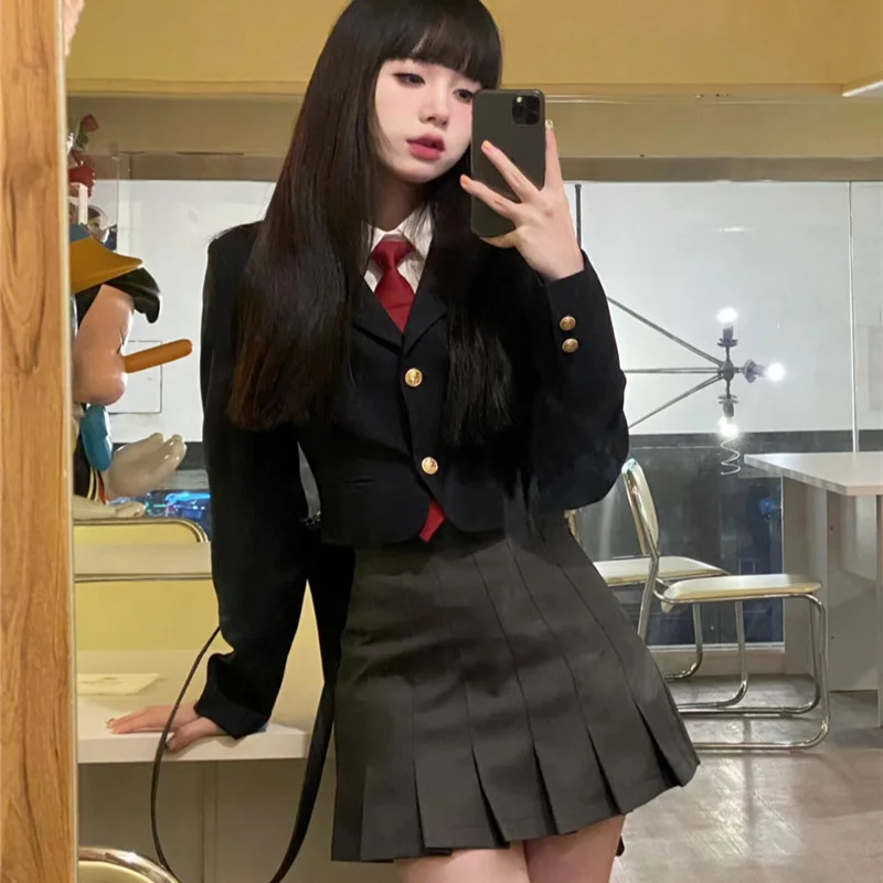 2024 nuovo coreano JK uniforme stile Preppy bianco maniche lunghe Top grigio gonna a pieghe vestito nero Versatile comodo cappotto Set ragazza