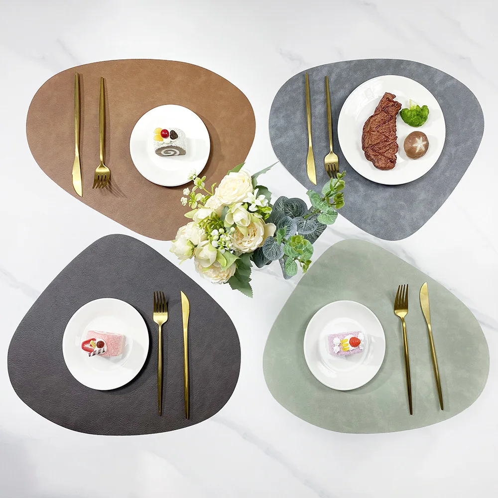 

4pcs droplet shaped leather placemats with different double-sided colors, anti slip and heat-insulating mats, dining table mats