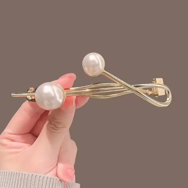 2024 New Simplicity Metal Pearl fermagli per capelli forcine fibbia a rana Clip a coda di cavallo elegante fermaglio per capelli da donna accessori estivi