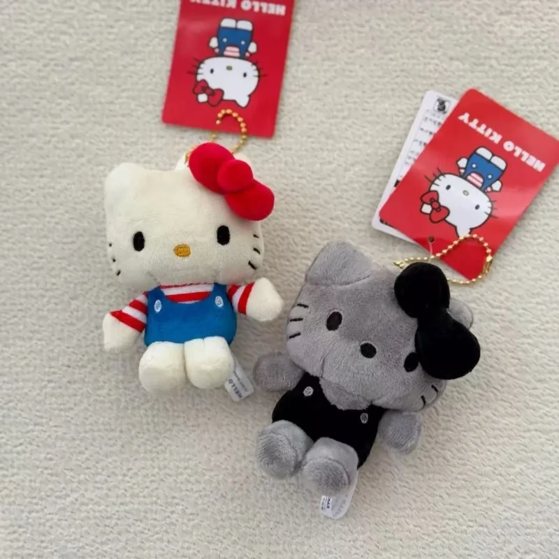 ตุ๊กตาเฮลโลคิตตี้น่ารักแบบพวงกุญแจ ตุ๊กตาซานริโอ้การ์ตูนกระโปรงจีบสไตล์ JK ตุ๊กตาคิตตี้ขาเรียวยาว ของเล่นพวงกุญแจ ชุดยูนิฟอร์ม จี้ห้อยกระเป๋า