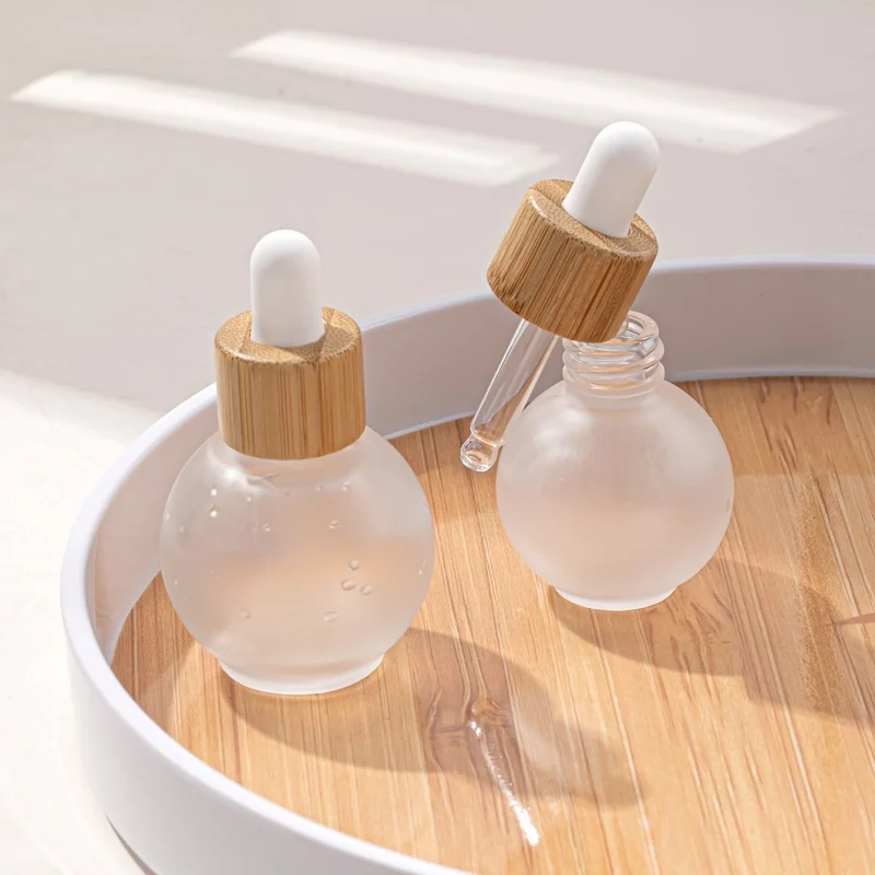 100pcs/lots Lovely Frosted Glass Ball-Shaped Dropper Bottle 20ml Essential Oil Jar with Bamboo Lid for Skin Care Serum