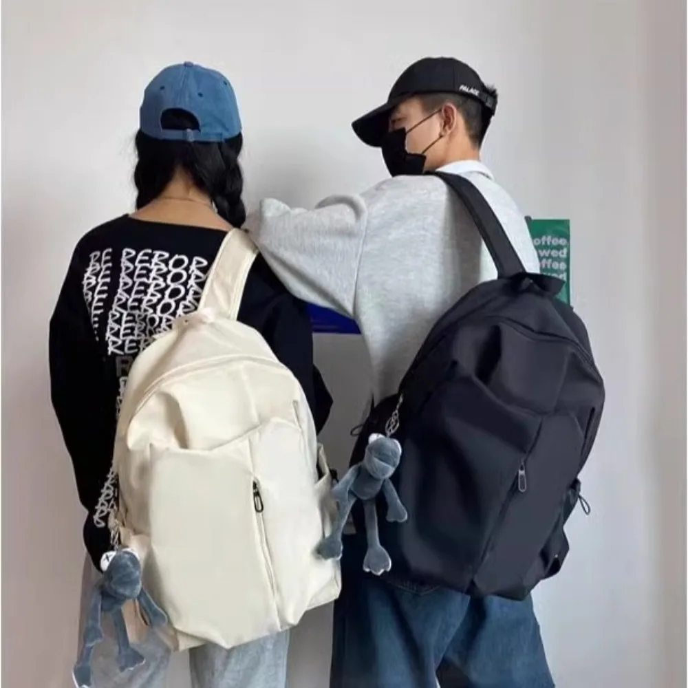 حقيبة ظهر عصرية مقاومة للأوساخ للكمبيوتر بسعة كبيرة بلون سادة حقيبة مدرسية للطلاب كاجوال بسحاب حقيبة كتف للسفر للنساء