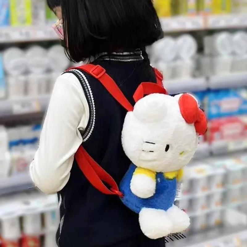 ของแท้อะนิเมะ Sanrio Hello Kitty ตุ๊กตาของเล่นหญิง Kawaii KT แมวไหล่กระเป๋าเป้สะพายหลังผู้หญิงกระเป๋านักเรียนเด็กตุ๊กตาสาวของขวัญวันเกิด