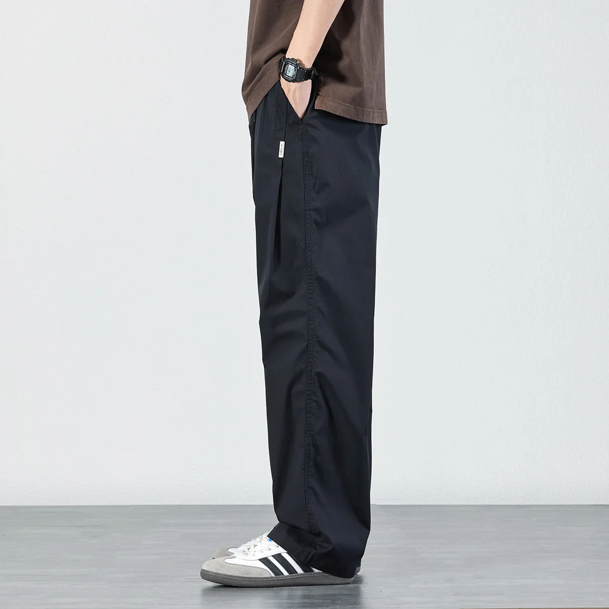 Rechte casual herenbroek lente en herfst eenvoudige effen kleur losse broek elastische veelzijdige broek met wijde pijpen trendy