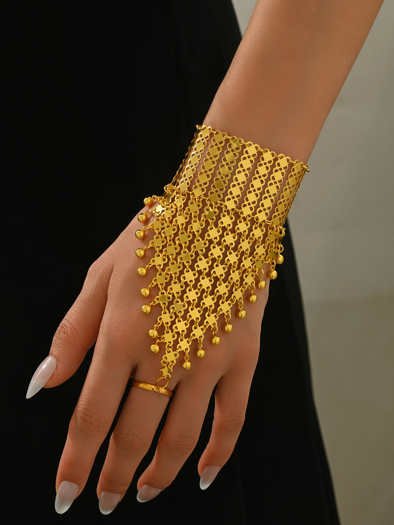 Unique Fashionable Golden Heavy-Duty Handmade Bead Bracelet With Dangling Beads. Luxurious And Perfect For Parties