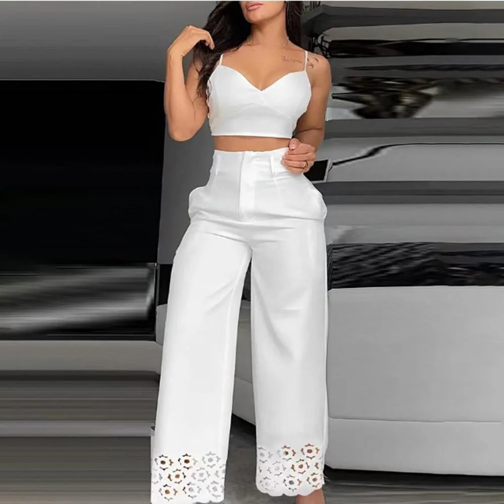 Pantaloni a vita alta con orlo cavo sottile bianco da donna e reggicalze Top corto Casual Set a due pezzi da donna 2024 Nuovo abito dolce estivo