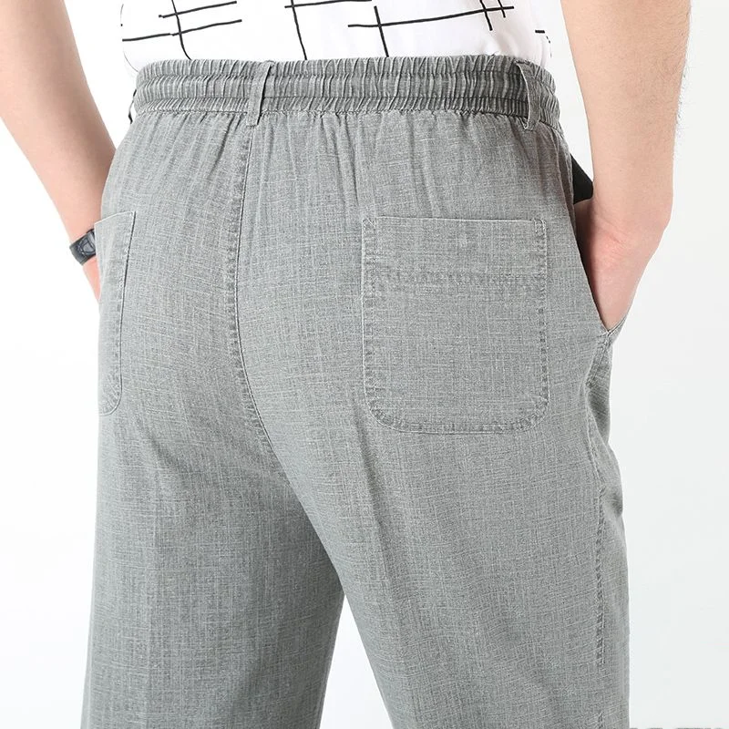 

Spring Fashion New Men Loose Comfortable Elastic Waist Pants Grey Solid Color Casual Commuting Cotton and Linen Pockets Pants