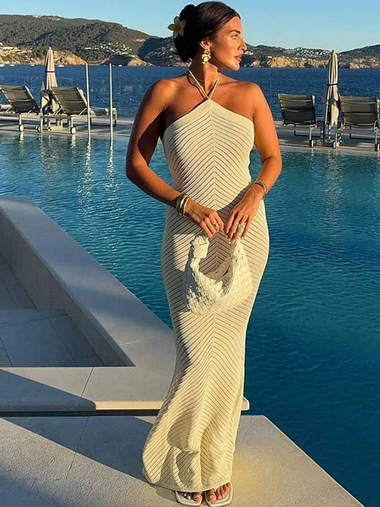 BKQU โครเชต์ Halter เซ็กซี่ Hollow Out Maxi ชุดผู้หญิงวันหยุดดูผ่าน Backless Lace Up Bodycon Elegant Party เสื้อคลุมยาว