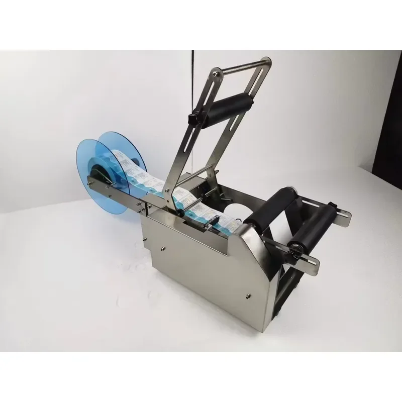 YAOMATEC Semi-automatic Round Bottle Labeling Machine, Small Handheld Glass Bottle Manual Labeling Machine.