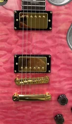 Guitar Made in China, large pink floral veneer, custom fingerboard inlay, white back