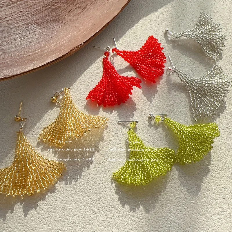 High-end hand-woven beaded earrings with apricot leaf design