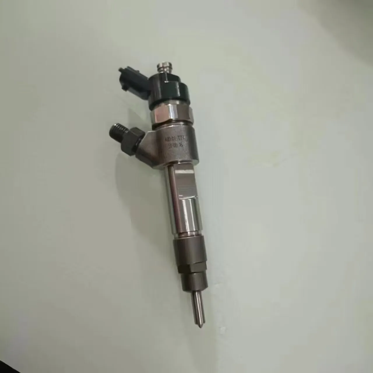 Boquilla del inyector de combustible del inyector del motor 0445120002