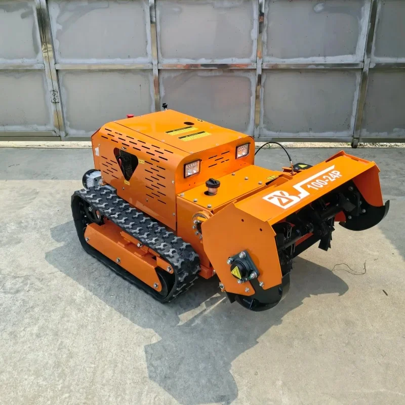 Factory direct-sale heavy-duty remote-controlled robot tracked lawn mower cutting grass on hillsides, orchards and slopes.
