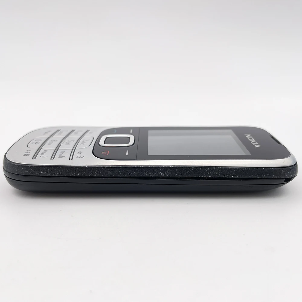 هاتف Nokia 2330 الكلاسيكي الأصلي المصنوع في فنلندا يدعم اللغة الإنجليزية بحالة جيدة فقط