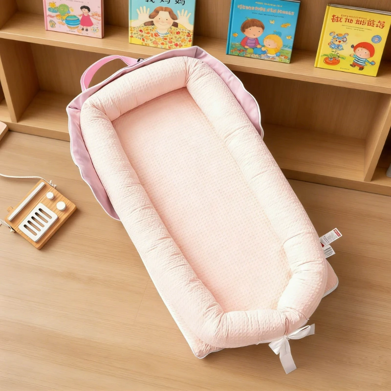 

Новая легкая и компактная переносная кроватка-гнездышко для младенцев 2026 года, портативная дорожная колыбель-переноска в стиле сумки через плечо для поездок на природу