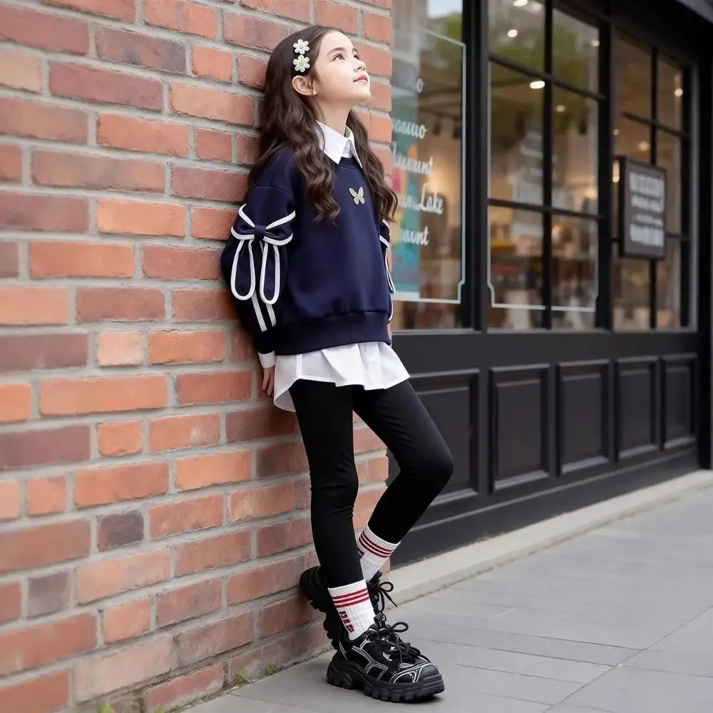 Faux Two Piece Girls Sweatshirt Layered Hem Preppy Style Faux Layered Sweatshirt Navy Bow Sleeve Accents Long Sleeve