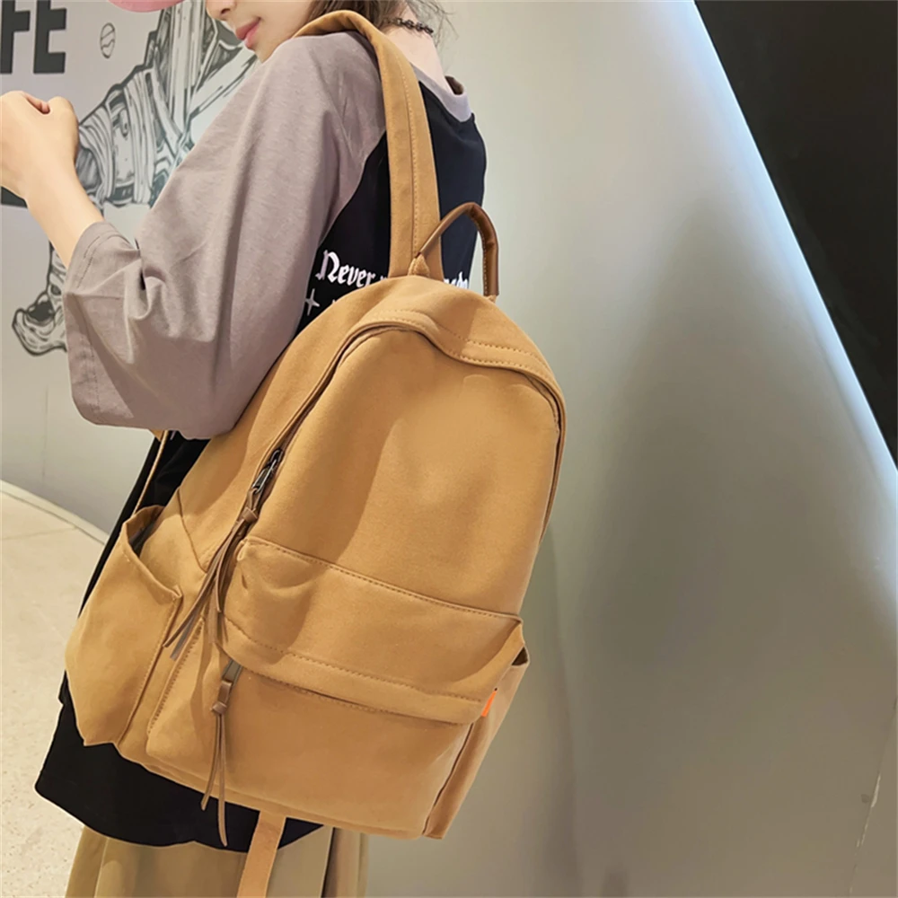 Mochila escolar para hombre y mujer, bolsa de viaje impermeable, bonita, de Color sólido, para estudiantes