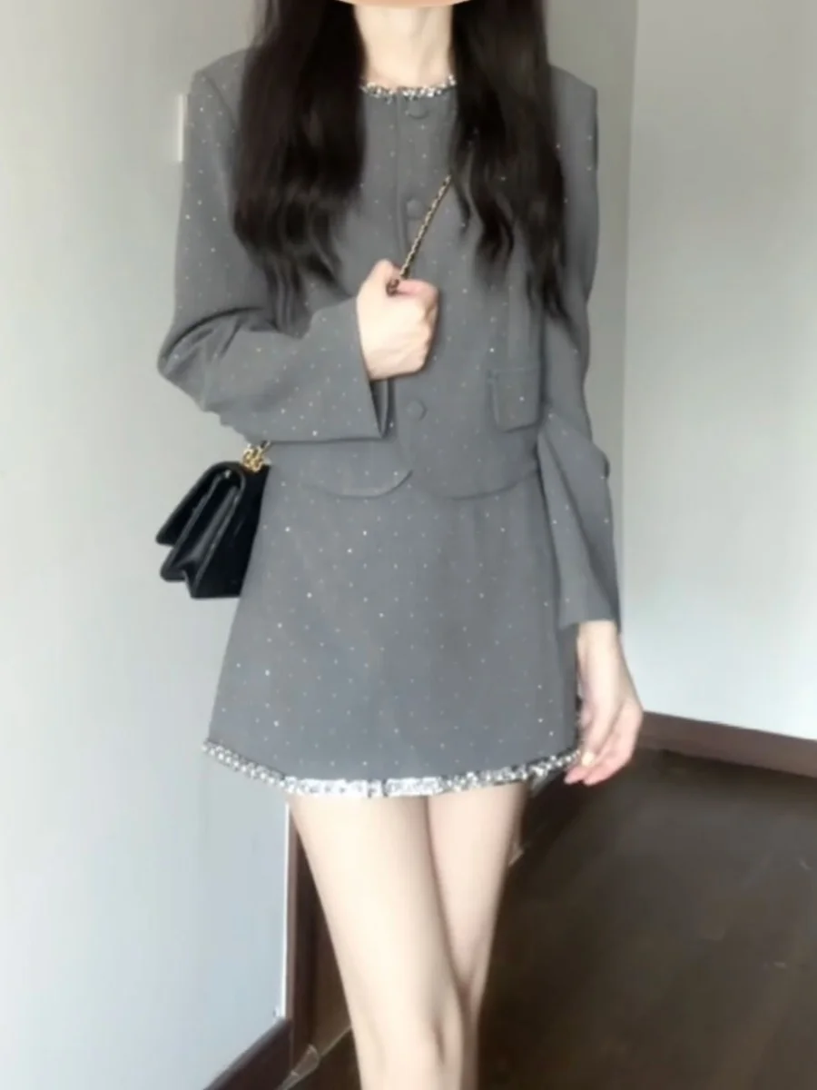 

Early Autumn French-style Sparkling Diamond Pearl Noble Lady Heiress Elegant Jacket and Short Skirt Two-piece Set Hot Sale Sweet