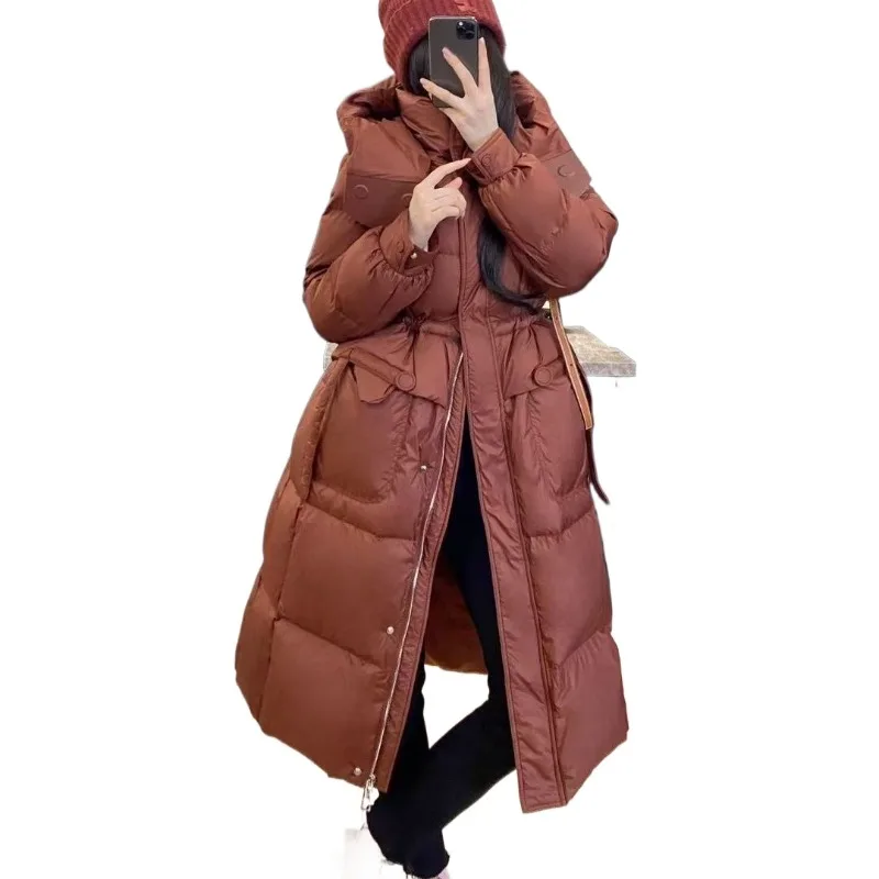 Pendolarismo alla moda ed elegante nell'autunno inverno Piumini da donna Soffio di fascia alta Piumino leggero di lusso con cappuccio in vita Muse