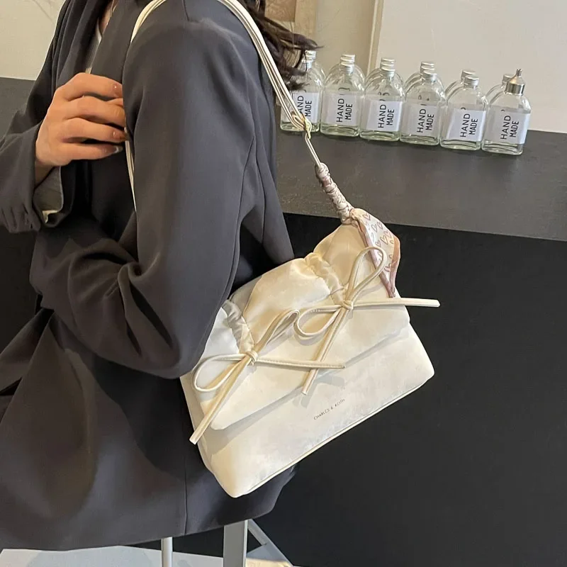 Linke Seite Fliege Umhängetaschen für Frauen 2024 Frühling koreanische Mode Umhängetasche Bänder Handtaschen und Geldbörsen Design klein