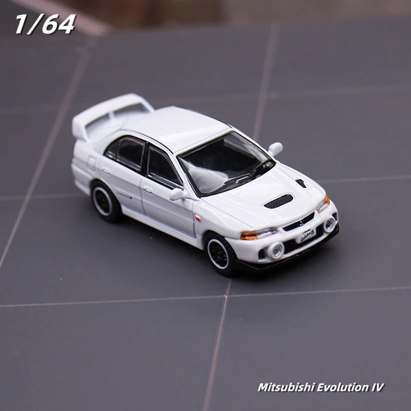 1/64 mitsubishis Lancer Evolution IV สี่โมเดลรถยนต์สปอร์ตอัลลอยด์โมเดลรถแข่งโลหะหล่อขึ้นรูปรถขนาดเล็กของขวัญสำหรับเด็ก