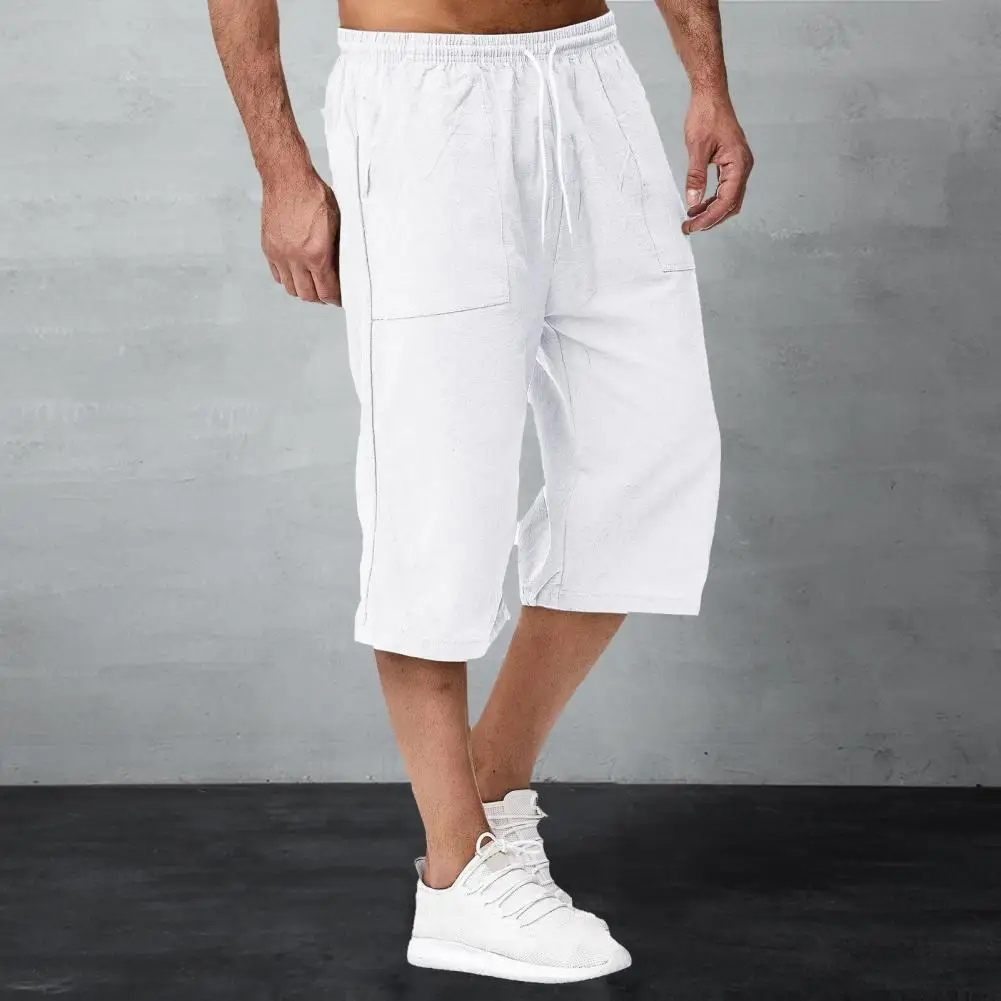

Regular Fit Cropped Pants Men's Mid-rise Elastic Drawstring Wide Leg Pants with Pockets Solid Color Streetwear for Summer