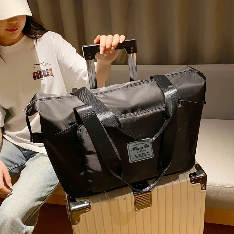 lightweight-travel-bag-women's-large-capacity-short-trip-carry-on-luggage-storage-bag-fashionable-oxford-cloth-foldable-bag