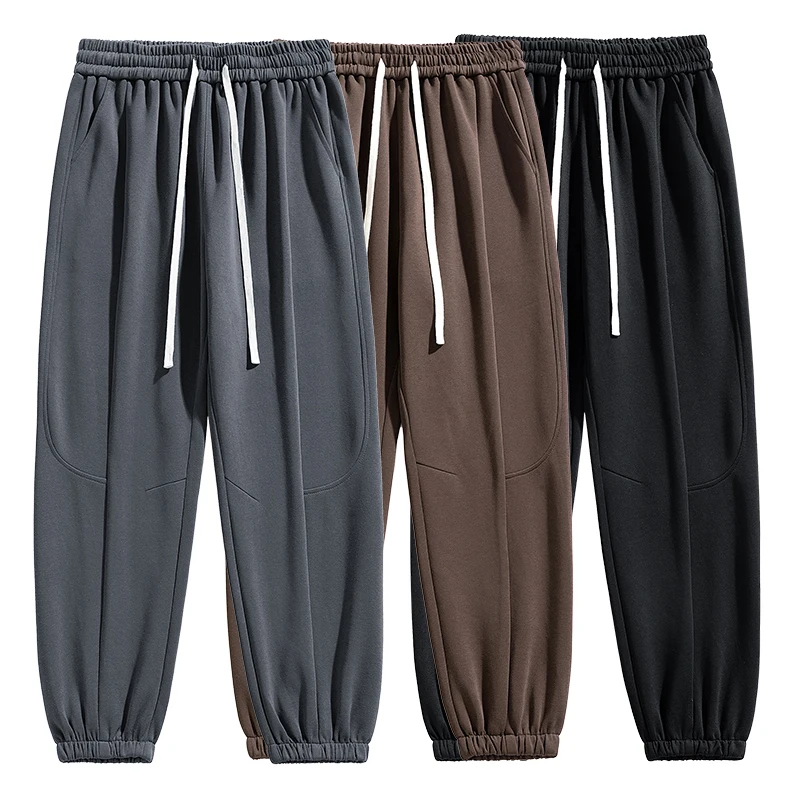 ذكر جديد فضفاض موضة Sweatpants جودة عالية كبيرة الحجم عادية مرونة الخصر الرباط السراويل الرجال ربيع الخريف بنطلون مستقيم