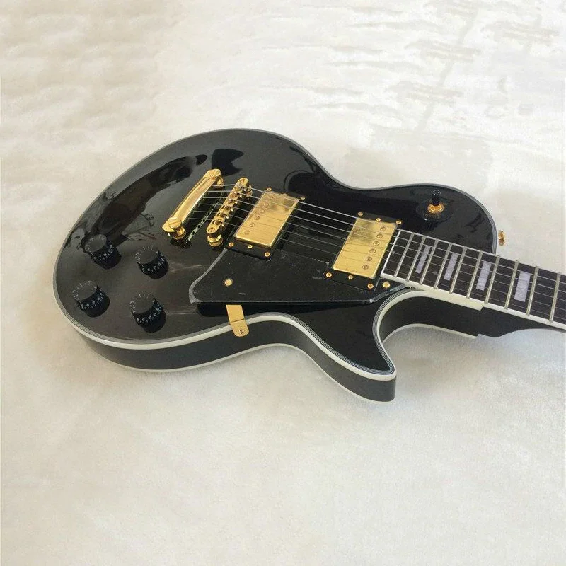 One piece LP black electric guitar with guaranteed quality and great feel, instrument can be customized