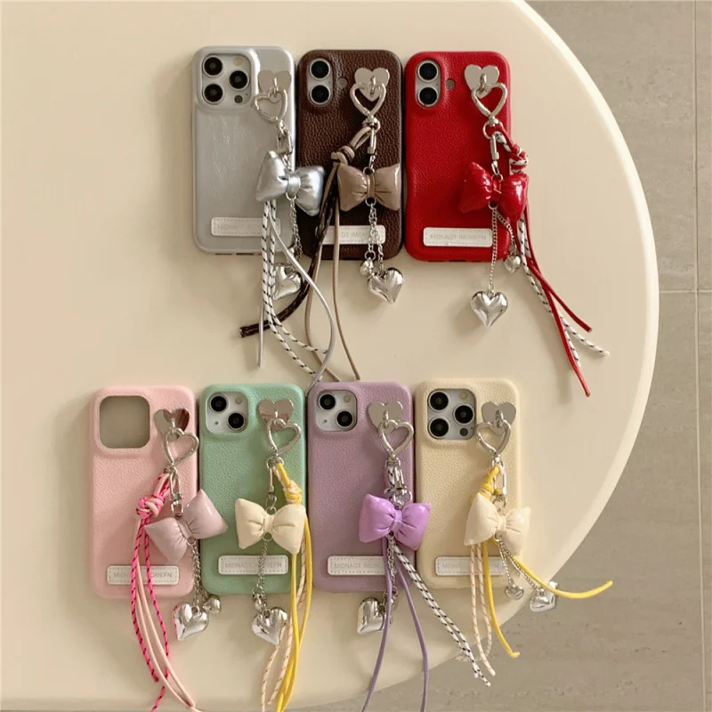 

Bow Heart Pendant Phone Case Compatible with Apple17/16PROSolid Color LeatheriPhone15/14PNiche