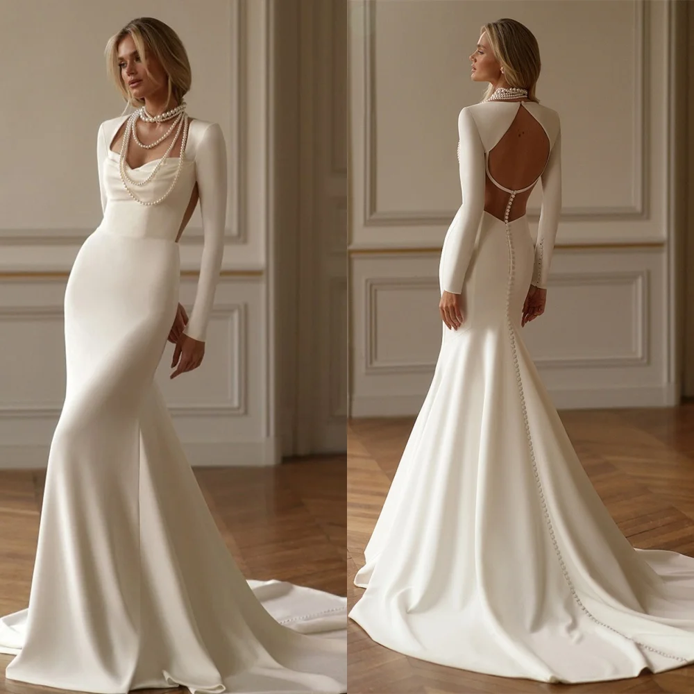 カスタマイズされたホワイトジャージーブライダルドレスエレガントなストラップレス長袖ウェディングドレスチャペルトレインボタンバックマーメイドドレス