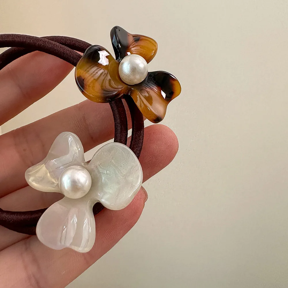 ربطة شعر أنيقة على شكل زهرة خلات ممتازة من أجل ذيل حصان منخفض عنابي