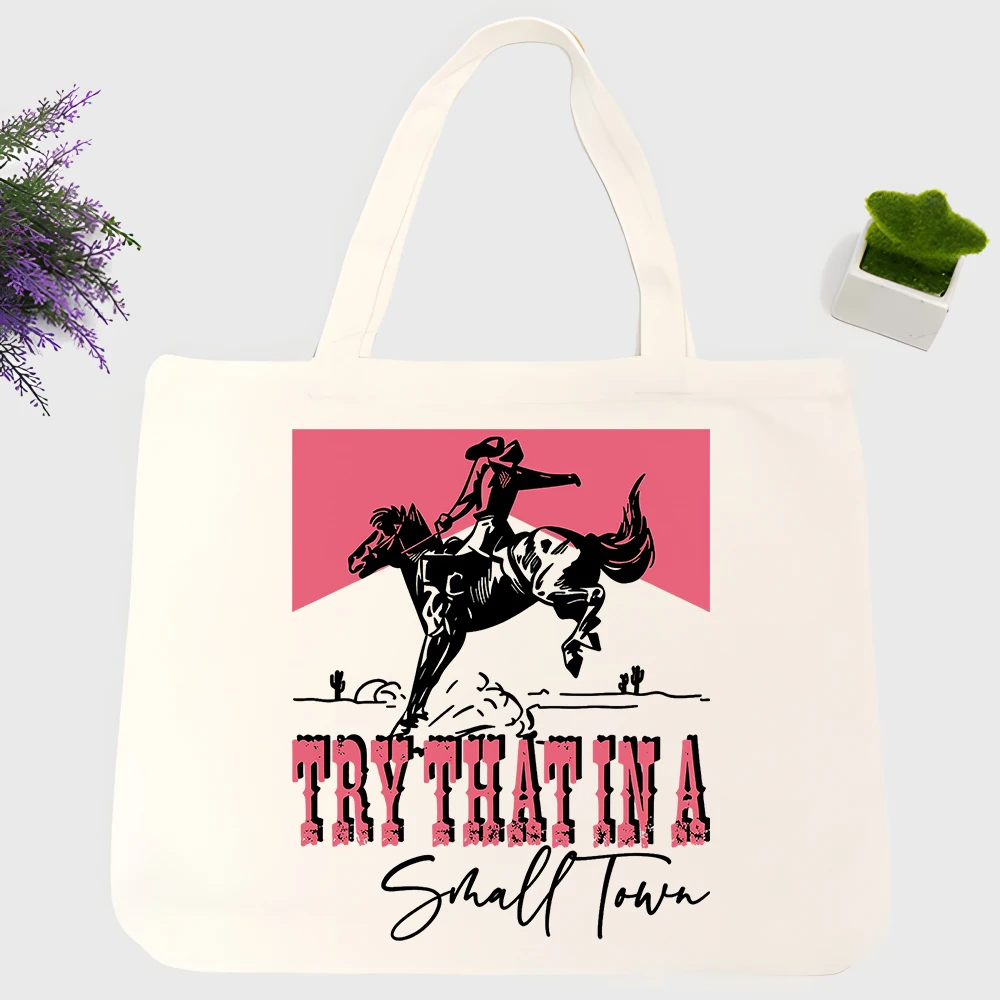 western rider graphic canvas tote bag with slogan-style print, perfect for casual daily use and weekend outings