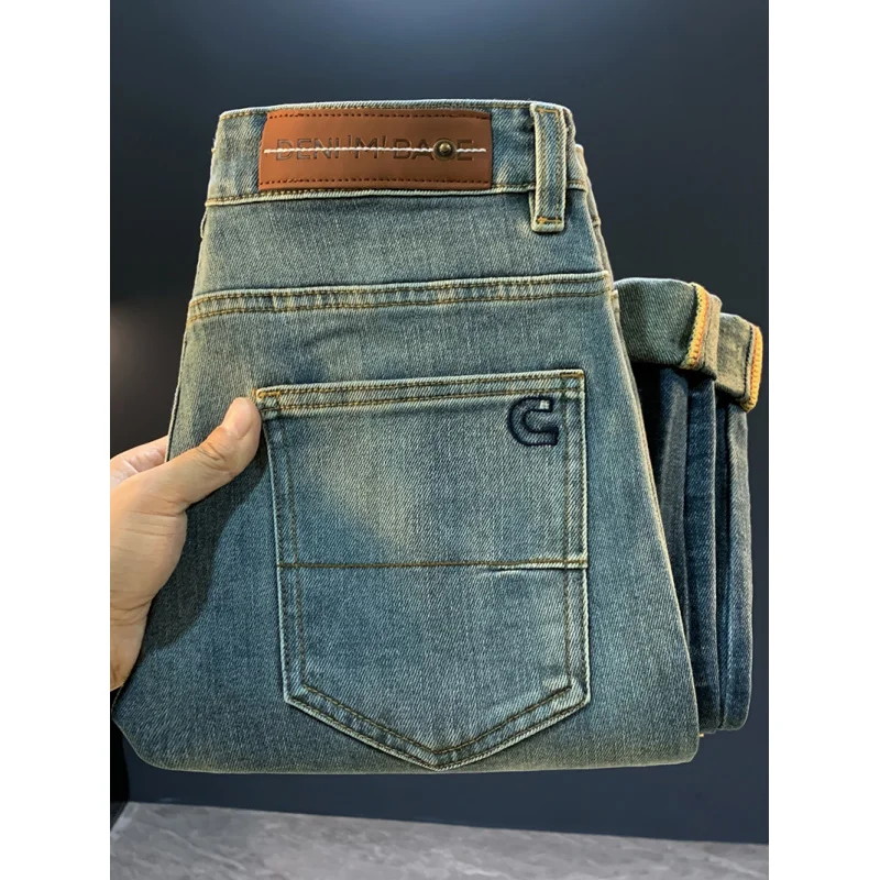 جينز عصري متدرج للرجال لخريف 2025 كاجوال مرن بقصة ضيقة وسراويل قصيرة عصرية