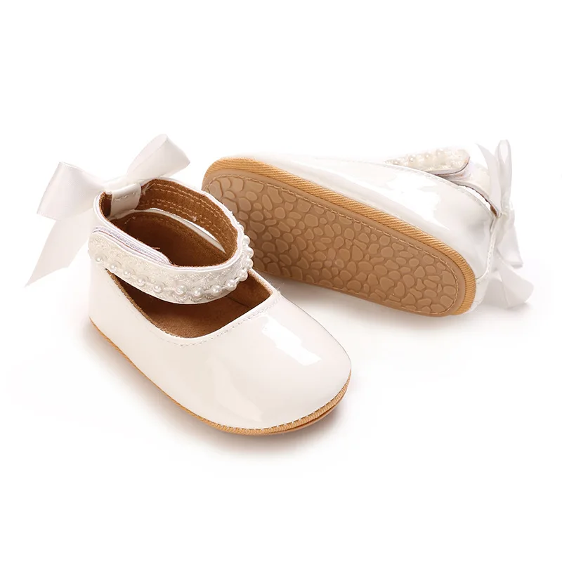 Nouvelles chaussures en cuir pour bébé de printemps 0-18 mois, chaussures de princesse pour bébé fille avec nœud mignon, semelle souple antidérapante, chaussures nude pour tout-petits