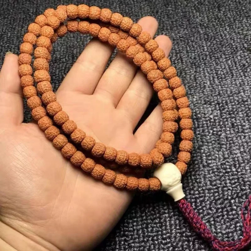 Pulsera pequeña de Rudraksha con diseño de escamas de dragón estilo tibetano de 5 pétalos, con borlas, 108 cuentas de Rudraksha originales, para oración budista