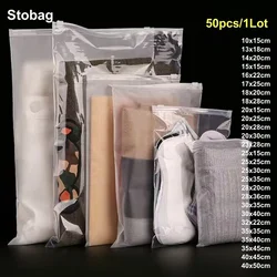 StoBag 50pcs Wholesale Frosted Transparent Clothes Zipper Package Bags Shirt Storage Plastic Clear Pouches Travel Organizer Logo