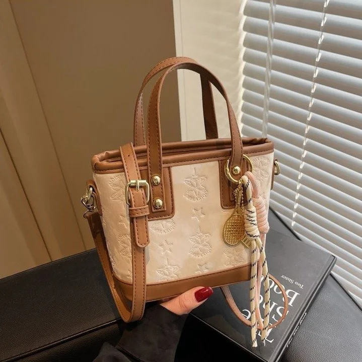 

Новинка 2023 года, женская сумка-мешок с тиснением цветных блоков, мини-кошелек через плечо с верхней ручкой, текстурированная сумка через плечо, шикарная и универсальная ​