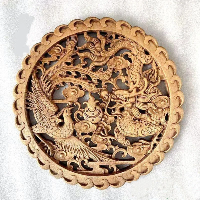 

Chinese xiangzhang wood carving ornament round solid wood hollow carving dragon and phoenix statue wall decoration crafts
