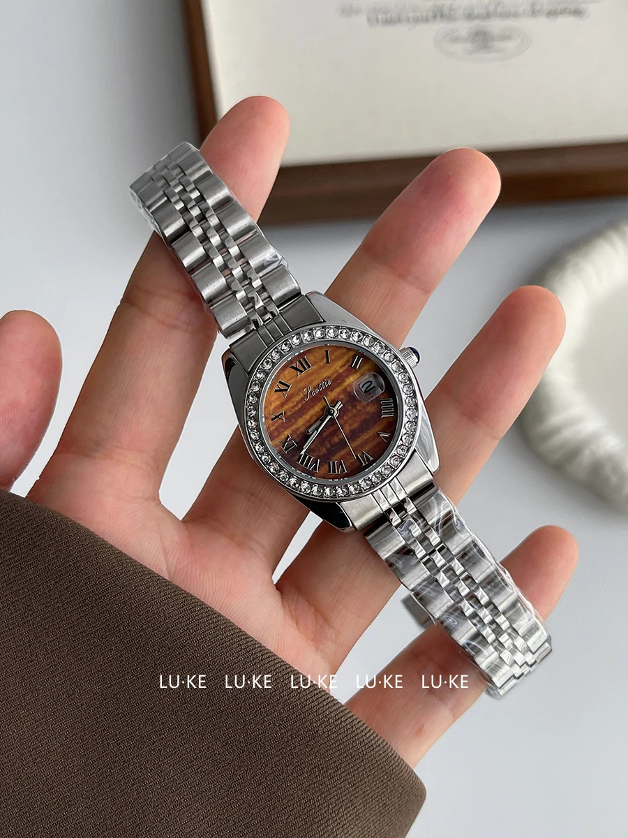 ساعة نسائية أنيقة، سوار فولاذي دائري فضي، طراز عتيق، ساعة كوارتز نسائية، ساعة كوارتز عصرية، هدية نسائية.