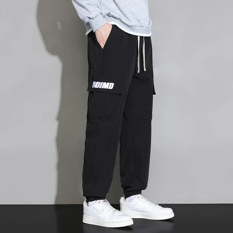 Basic Youthful Vitality Casual Pants Stylish Pockets Spliced Spring Autumn Letter Korean Men's Clothing Drawstring Cropped Pants