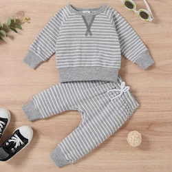 A new two-piece set of striped patchwork long sleeved top and elastic waist pants for 1-3 year old baby boys and girls