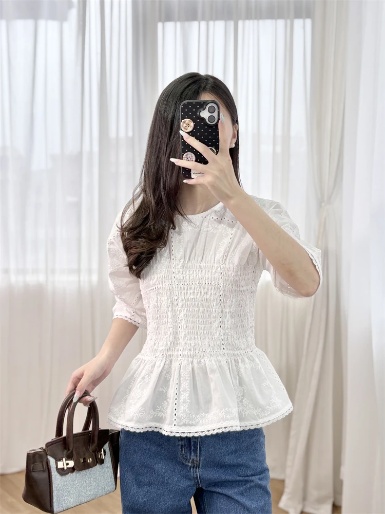 

White, heavily embroidered, hollowed-out lace short-sleeved, round-neck, elegant, pleated and cinched waist shirt top