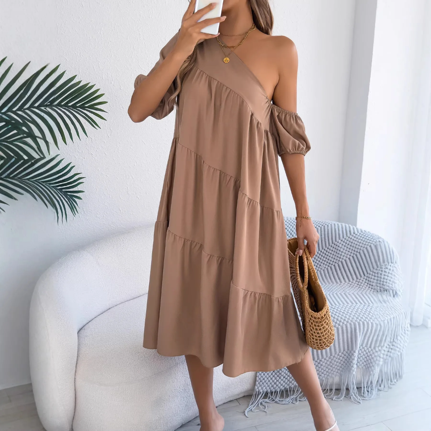 Sloping collar short-sleeved loose ruffled skirt womens 2026 summer new park commuting all-match loose solid color holiday dress