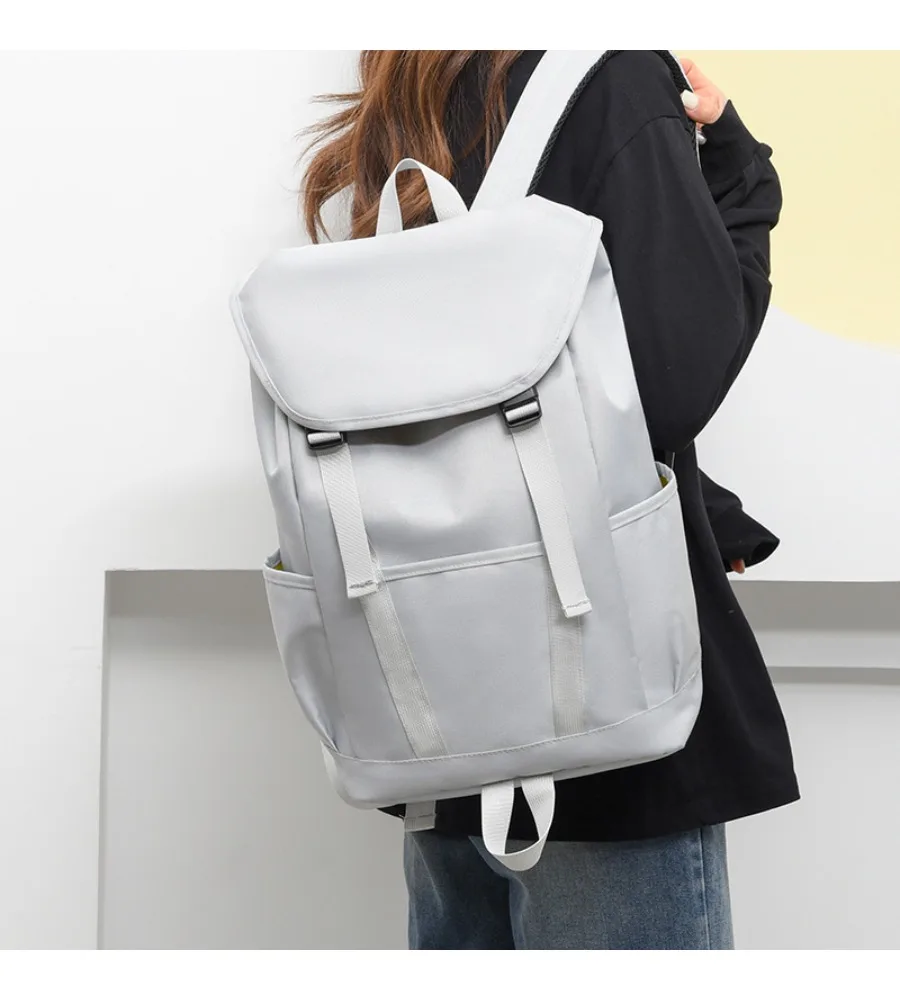 Royal blue flip top canvas backpack anti splash adjustable straps for college students daily schooling weekend outdoor travel