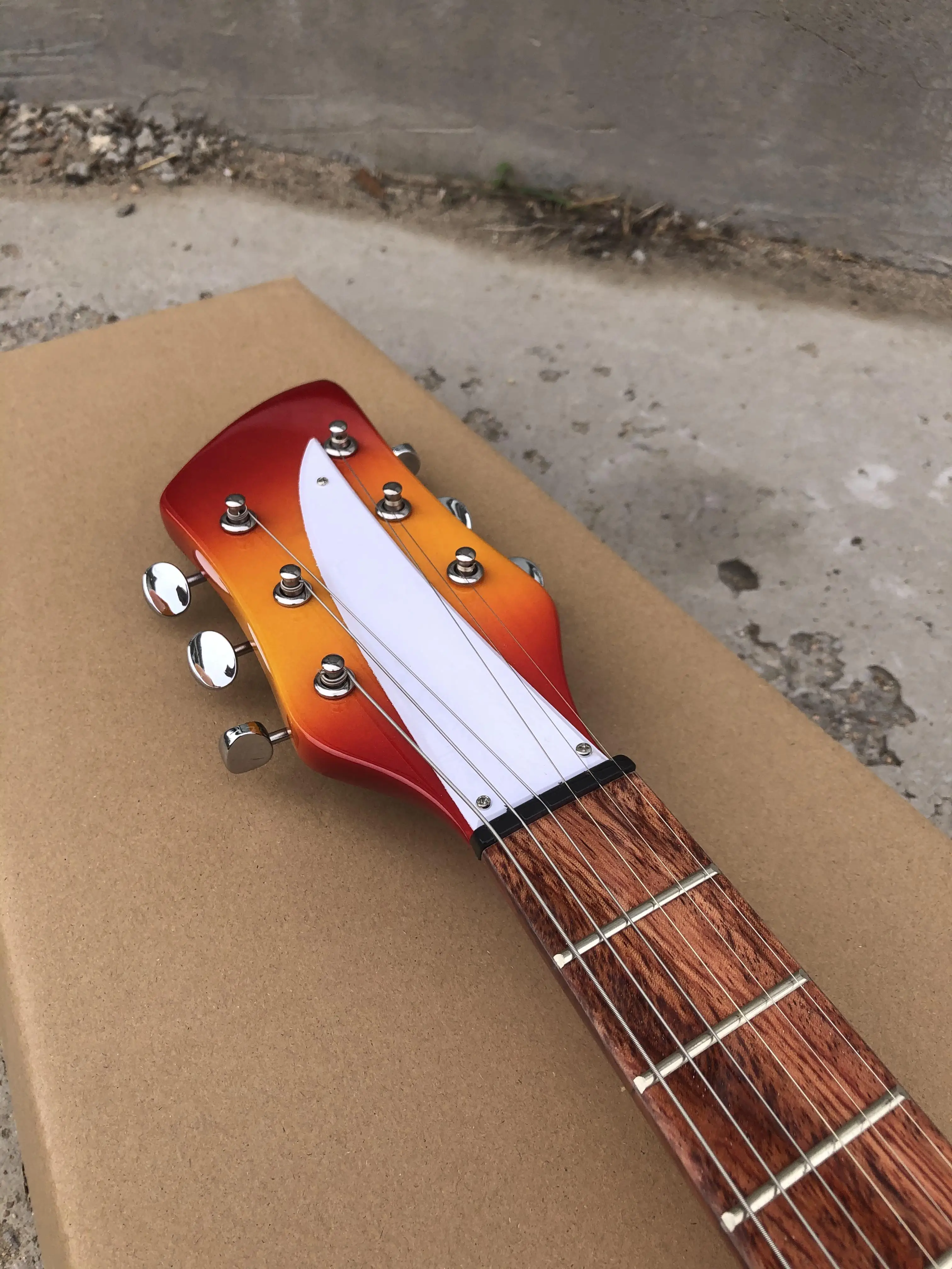 Electric Guitar with Rickenbackerf Hole, Cherry Sunburst Color, RosewoodFretboard, Tremolo System, Semi-Hollow Body Instrument,